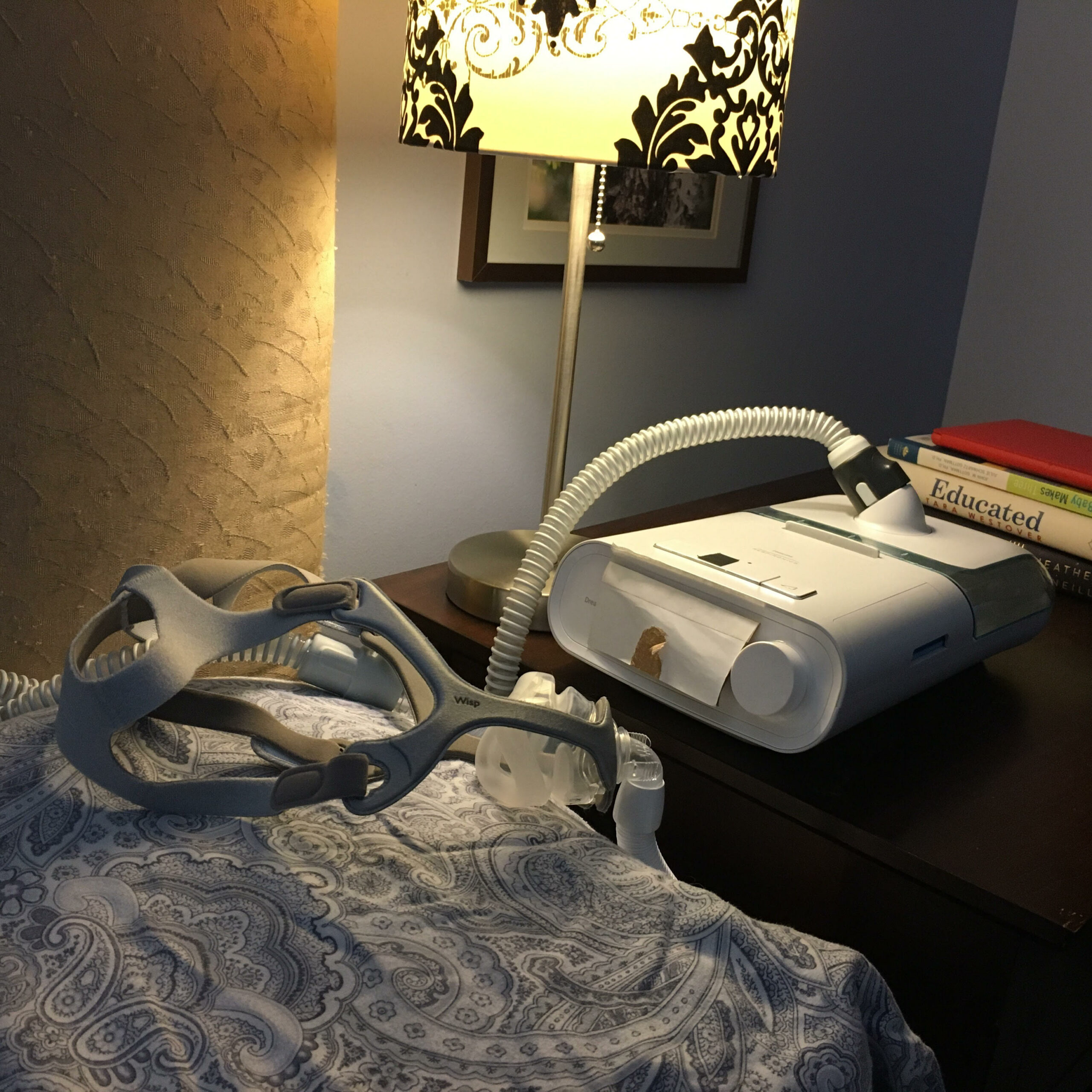 My trusty BiPAP and face mask which Dr Coles and Dave helped me get during my pregnancies when my air swallowing made my CPAP unusable for me. BiPAPs have two levels of pressure (lower pressure on the exhale) which helped make my air swallowing more manageable. I added the cardboard flap on the front to cover the bright light that comes on when you turn the machine on.
