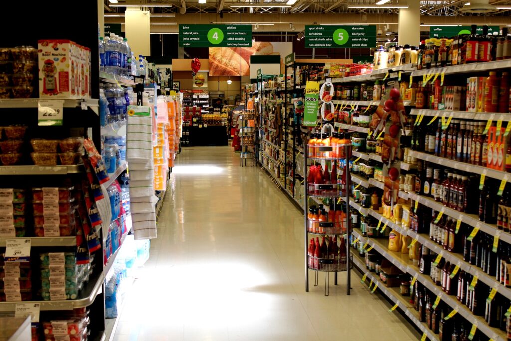 full grocery store aisle with extra display in the middle