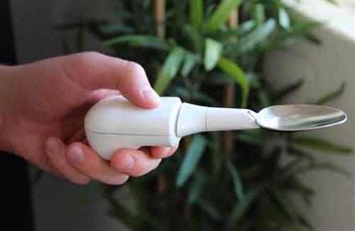 163297.jpg White Liftware stabilizer with spoon and fork