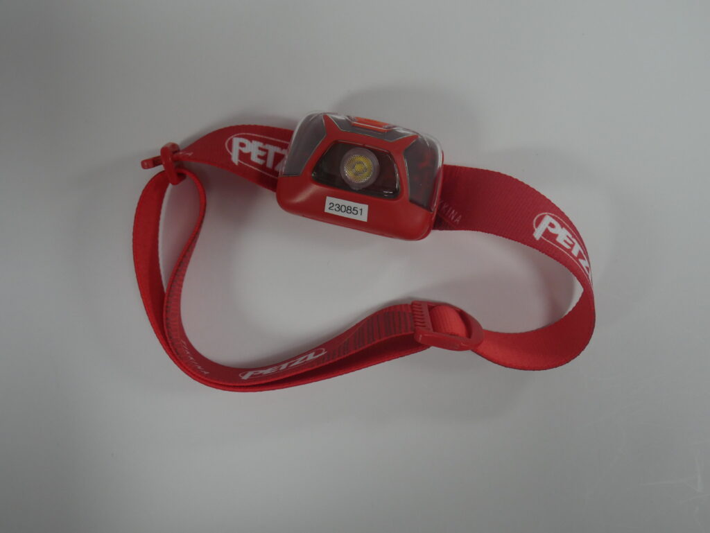 Red Petzl TIKKINA Headlamp