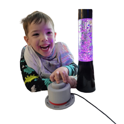 Outdoor Rec (6) kid with gray 3d printed switch connected by black wire to switch adapted glitter lamp