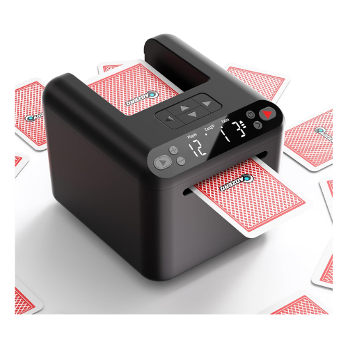autodeal automatic card dealer black cube with cards stacked in it and a display on the front stating how many players and cards and then a card coming out of the front and surrounding the cube is piles of cards that were dealt out