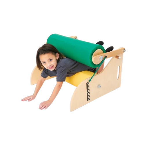 steamroller wooden structure with two padded rollers one green one yellow with a child squeezing through the two rollers smiling